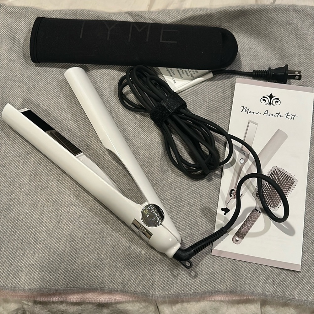 Rodan + Fields Tyme Iron NWOT.  Styling brush not included.  Never used.